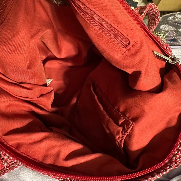 The Sak multi colored crotchet purse. Red interior in good condition. Preowned - Picture 6 of 7